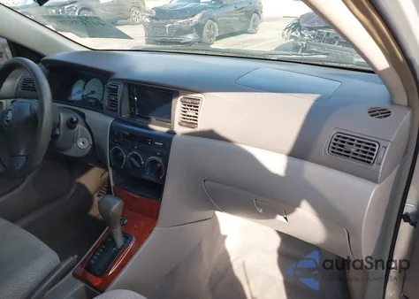 2004 Toyota Corolla Le z USA, uszkodzony, nr VIN JTDBR32EX42024809